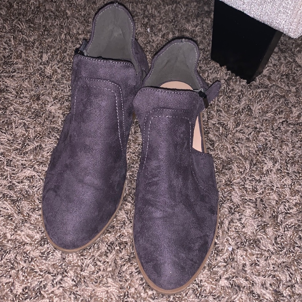 Grey cutout ankle booties by the brand Reneeze